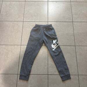 Nike Sportswear Heather Grey Fleece Joggers with Large Swoosh Graphic Size S